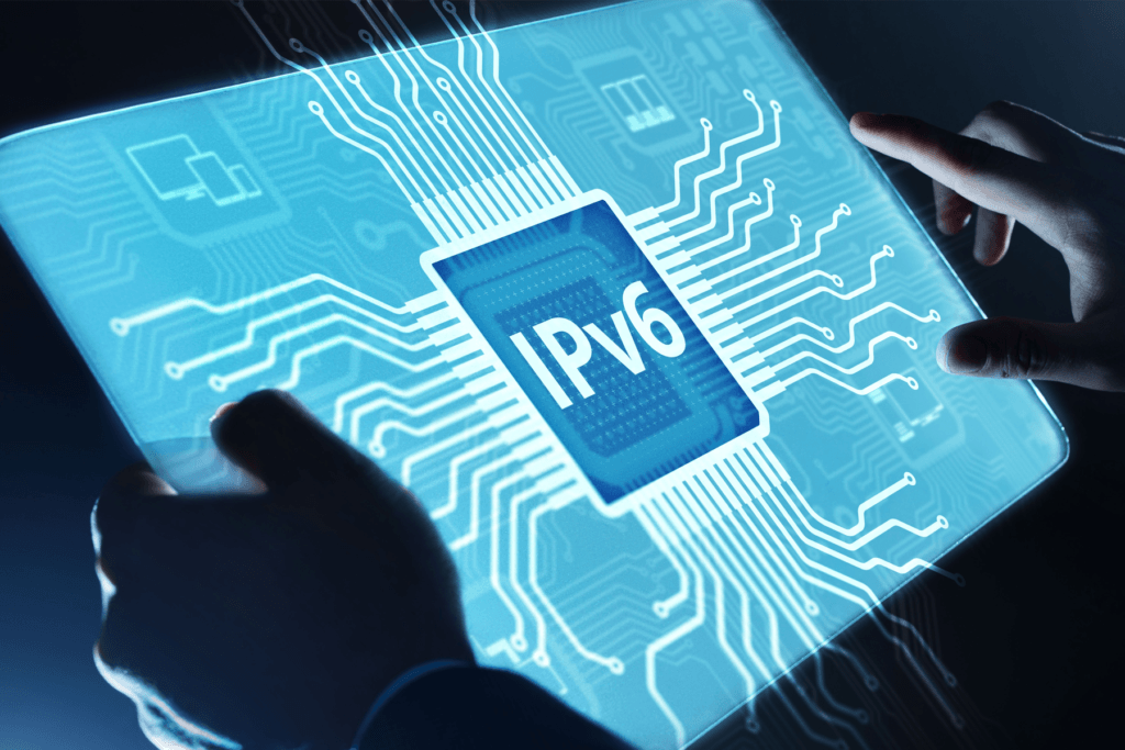 A person holds a tablet with IPv6 displayed as they decide whether to disable IPv6