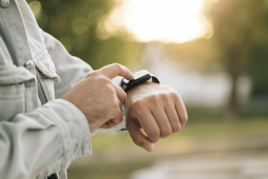 someone checking health data on watch